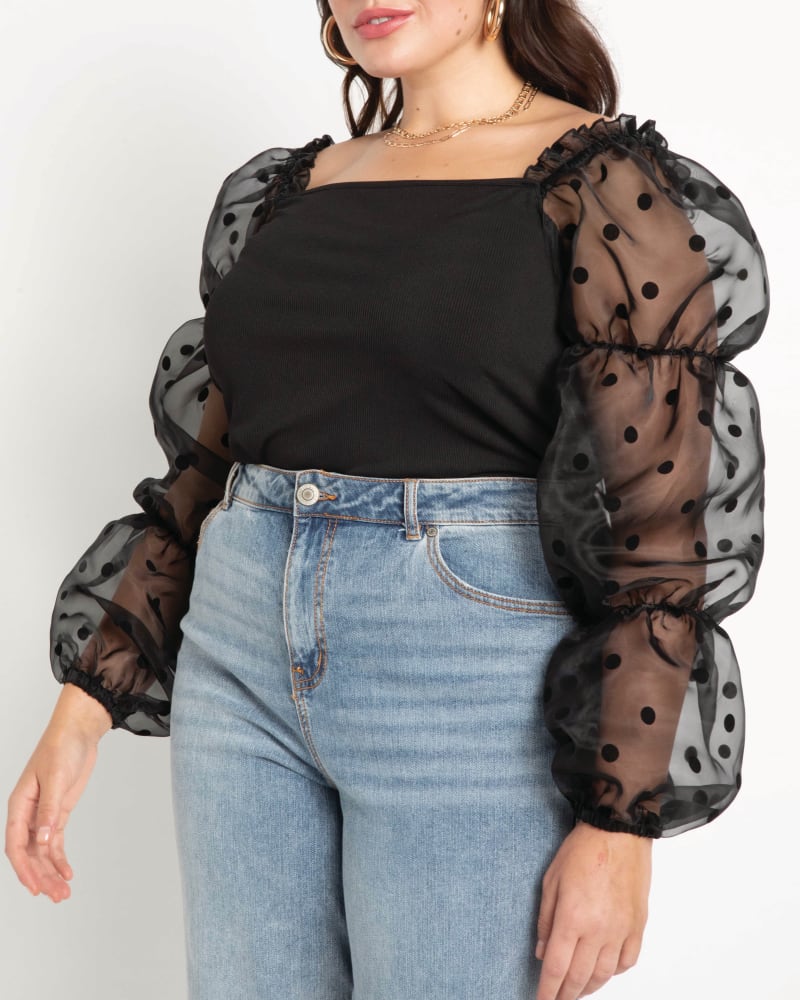 Front of a model wearing a size 14|16 Joyce Flocked Organza Sleeve Top in Black by ELOQUII. | dia_product_style_image_id:204223